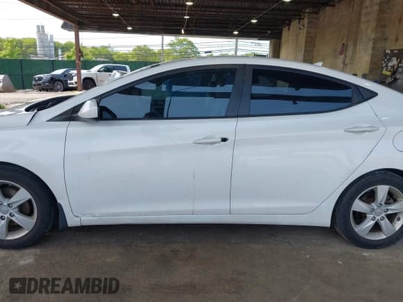 ✅ 2013 Hyundai Elantra GLS • VIN: 5NPDH4AE9DH392979 • Lot: 42394974. Listed on IAAI with 69,077 mi. Free auction sales archive from the USA and detailed vehicle history report at DreamBid. Image 14.