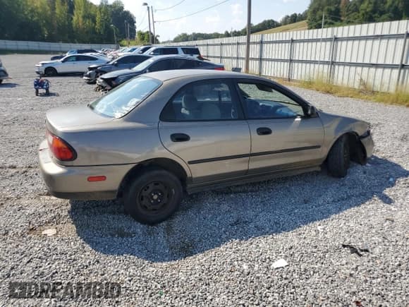 ✅ 1997 Mazda Protege DX • VIN: JM1BC1416V0145687 • Lot: 81469525. Wystawiony na Copart z przebiegiem 277 313 mil. Bezpłatny archiwum sprzedaży aukcyjnych z USA i szczegółowy raport historii pojazdu na DreamBid. Zdjęcie 3.