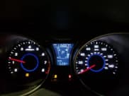 ✅ 2013 Hyundai Veloster w/Gray Int • VIN: KMHTC6AD8DU119739 • Lot: 81710714. Wystawiony na Copart z przebiegiem 115 007 mil. Bezpłatny archiwum sprzedaży aukcyjnych z USA i szczegółowy raport historii pojazdu na DreamBid. Zdjęcie 9.