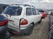 ✅ 2002 Hyundai Santa Fe GLS • VIN: KM8SC73D92U175975 • Лот: 71291915. Опубликован ранее на Copart с пробегом 124 648 миль. Бесплатный доступ к архиву аукционных продаж из США и подробный отчёт об истории автомобиля на DreamBid. Изображение 3.