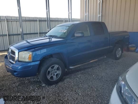 2006 Dodge Dakota SLT с VIN 1D7HW48N16S704445, выставлен на аукционе Copart как лот 73714614 с пробегом 128 585 миль миль и Чистый • Clean title. История ставок и продаж доступна на DreamBid. Изображение 1.