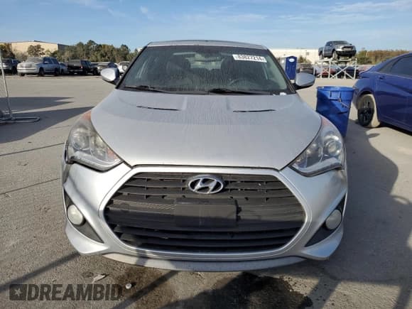 ✅ 2013 Hyundai Veloster Turbo • VIN: KMHTC6AEXDU128130 • Lot: 83827214. Wystawiony na Copart z przebiegiem 173 288 mil. Bezpłatny archiwum sprzedaży aukcyjnych z USA i szczegółowy raport historii pojazdu na DreamBid. Zdjęcie 5.