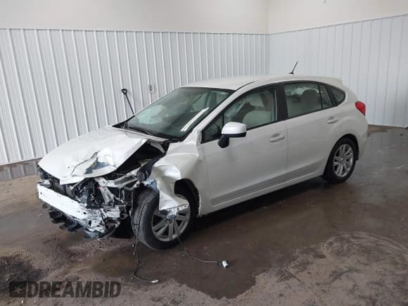 ✅ 2016 Subaru Impreza Premium • VIN: JF1GPAB63G8273405 • Lot: 42795751. Listed on IAAI with 124,711 mi. Free auction sales archive from the USA and detailed vehicle history report at DreamBid. Image 2.