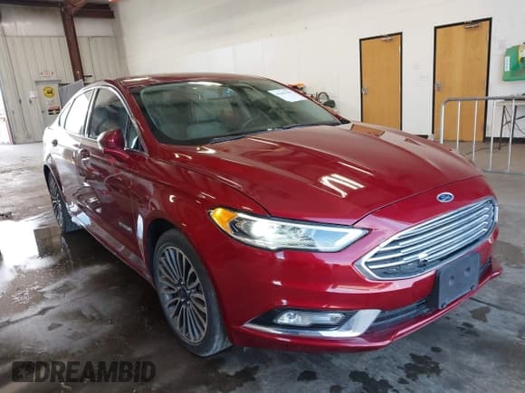 ✅ 2017 Ford Fusion Hybrid Titanium • VIN: 3FA6P0RUXHR158259 • Лот: 42463561. Опубликован ранее на IAAI с пробегом 206 211 миль. Бесплатный доступ к архиву аукционных продаж из США и подробный отчёт об истории автомобиля на DreamBid. Изображение 1.