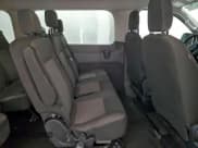 ✅ 2023 Ford Transit Passenger XLT • VIN: 1FBAX2YGXPKA94145 • Лот: 94169395. Опубликован ранее на Copart с пробегом 61 374 миль. Бесплатный доступ к архиву аукционных продаж из США и подробный отчёт об истории автомобиля на DreamBid. Изображение 11.