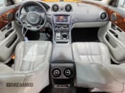 ✅ 2013 Jaguar XJ • VIN: SAJWA1C7XD8V57304 • Лот: 92613725. Опубликован ранее на Copart с пробегом 143 736 миль. Бесплатный доступ к архиву аукционных продаж из США и подробный отчёт об истории автомобиля на DreamBid. Изображение 8.