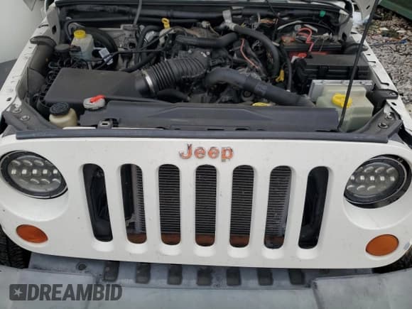 ✅ 2008 Jeep Wrangler X • VIN: 1J4FZ24168L526507 • Lot: 85711354. Listed on Copart with 204,531 mi. Free auction sales archive from the USA and detailed vehicle history report at DreamBid. Image 12.