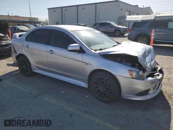 ✅ 2014 Mitsubishi Lancer GT • VIN: JA32U8FWXEU004031 • Lot: 52443945. Listed on Copart with 159,528 mi. Free auction sales archive from the USA and detailed vehicle history report at DreamBid. Image 4.