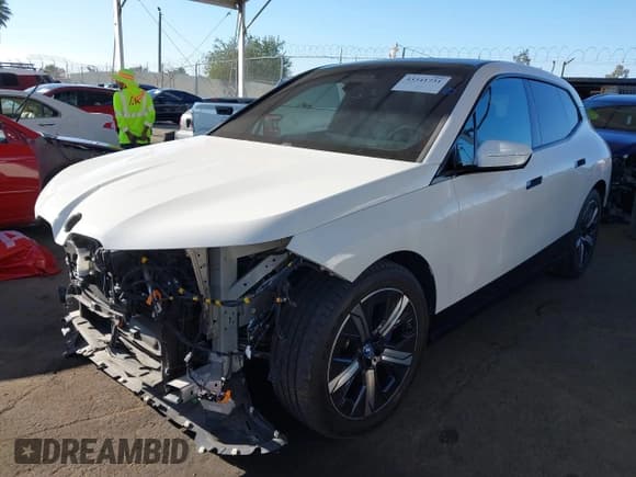 ✅ 2023 BMW iX xDrive50 • VIN: WB523CF01PCM48437 • Lot: 43341731. Listed on IAAI with 17,722 mi. Free auction sales archive from the USA and detailed vehicle history report at DreamBid. Image 20.