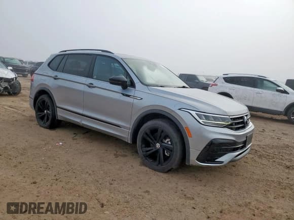 ✅ 2023 Volkswagen Tiguan SE R-Line Black • VIN: 3VVCB7AX8PM055963 • Лот: 81393195. Опубликован ранее на Copart с пробегом 57 930 миль. Бесплатный доступ к архиву аукционных продаж из США и подробный отчёт об истории автомобиля на DreamBid. Изображение 4.