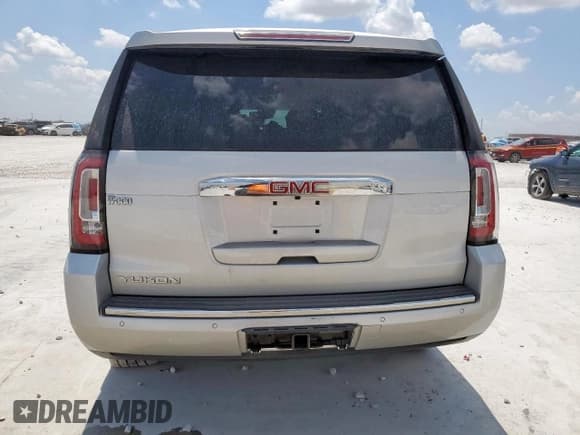 ✅ 2018 GMC Yukon Denali • VIN: 1GKS1CKJ2JR395443 • Lot: 69065785. Wystawiony na Copart z przebiegiem 27 888 mil. Bezpłatny archiwum sprzedaży aukcyjnych z USA i szczegółowy raport historii pojazdu na DreamBid. Zdjęcie 6.