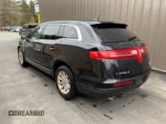 ✅ 2016 Lincoln MKT • VIN: 2LMHJ5NK0GBL00069 • Lot: 50319965. Listed on Copart with 115,725 mi. Free auction sales archive from the USA and detailed vehicle history report at DreamBid. Image 3.