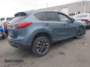 ✅ 2016 Mazda CX-5 Grand Touring • VIN: JM3KE4DY0G0790824 • Lot: 43736594. Wystawiony na IAAI z przebiegiem Nie podano. Bezpłatny archiwum sprzedaży aukcyjnych z USA i szczegółowy raport historii pojazdu na DreamBid. Zdjęcie 4.