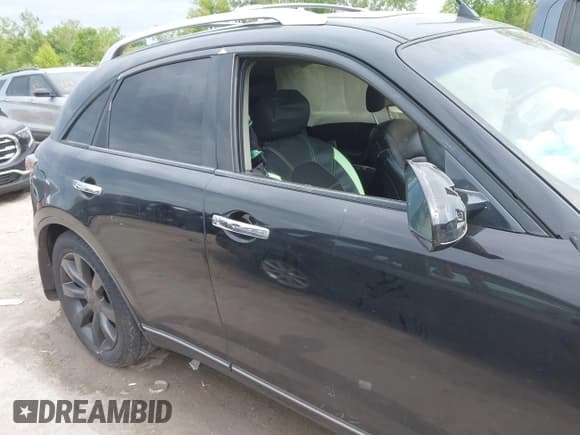 ✅ 2005 Infiniti FX • VIN: JNRAS08W55X221034 • Lot: 42381211. Listed on IAAI with 131,415 mi. Free auction sales archive from the USA and detailed vehicle history report at DreamBid. Image 13.