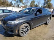 ✅ 2021 BMW X4 M40i • VIN: 5UX2V5C04M9H55156 • Лот: 46468455. Опубликован ранее на Copart с пробегом 40 621 миль. Бесплатный доступ к архиву аукционных продаж из США и подробный отчёт об истории автомобиля на DreamBid. Изображение 1.