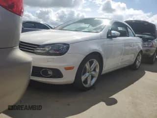 ✅ 2012 Volkswagen Eos Lux • VIN: WVWFW7AH3CV014035 • Lot: 74364264. Listed on Copart with 88,222 mi. Free auction sales archive from the USA and detailed vehicle history report at DreamBid. Image 1.