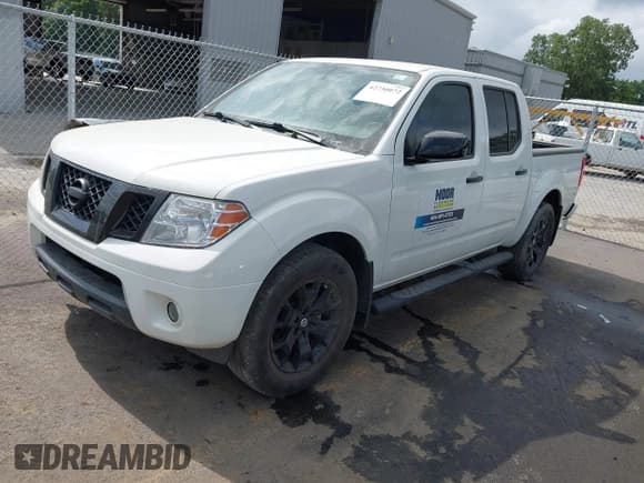 ✅ 2021 Nissan Frontier SV • VIN: 1N6ED0EA9MN723413 • Lot: 42730072. Listed on IAAI with 63,182 mi. Free auction sales archive from the USA and detailed vehicle history report at DreamBid. Image 2.