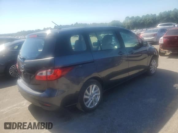 ✅ 2014 Mazda 5 Sport • VIN: JM1CW2BLXE0165897 • Lot: 89671535. Listed on Copart with 101,684 mi. Free auction sales archive from the USA and detailed vehicle history report at DreamBid. Image 3.