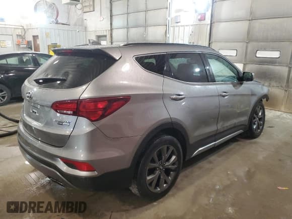 ✅ 2018 Hyundai Santa Fe Ultimate • VIN: 5XYZWDLA9JG531257 • Лот: 44883014. Опубликован ранее на Copart с пробегом 103 412 миль. Бесплатный доступ к архиву аукционных продаж из США и подробный отчёт об истории автомобиля на DreamBid. Изображение 3.