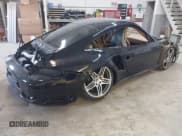 ✅ 2007 Porsche 911 Turbo • VIN: WP0AD29927S784945 • Lot: 41653014. Listed on IAAI with 52,319 mi. Free auction sales archive from the USA and detailed vehicle history report at DreamBid. Image 4.