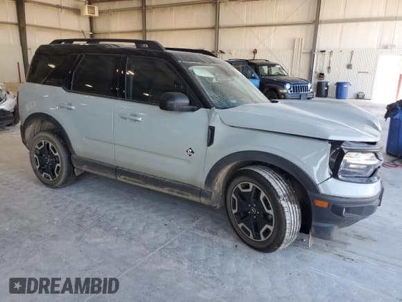 ✅ 2022 Ford Bronco Sport Outer Banks • VIN: 3FMCR9C68NRD62619 • Лот: 81582145. Опубликован ранее на Copart с пробегом 18 706 миль. Бесплатный доступ к архиву аукционных продаж из США и подробный отчёт об истории автомобиля на DreamBid. Изображение 4.