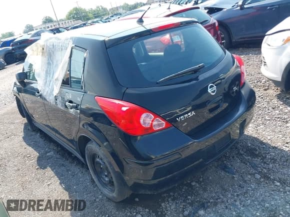 ✅ 2009 Nissan Versa S • VIN: 3N1BC13E39L409030 • Lot: 42850579. Listed on IAAI with 129,129 mi. Free auction sales archive from the USA and detailed vehicle history report at DreamBid. Image 3.