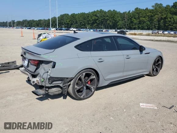 ✅ 2021 Audi RS 5 Sportback • VIN: WUAAWCF54MA903147 • Лот: 71985845. Опубликован ранее на Copart с пробегом 91 747 миль. Бесплатный доступ к архиву аукционных продаж из США и подробный отчёт об истории автомобиля на DreamBid. Изображение 3.