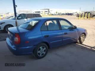 2002 Hyundai Accent GL with VIN KMHCG45C32U332833, listed as a Copart auction lot 66539644 with 69,763 mi miles and Salvage title. Bid and sale history available at DreamBid. Image 3.