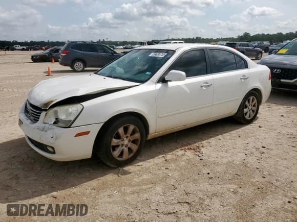 ✅ 2008 Kia Optima LX • VIN: KNAGE124585235737 • Лот: 59634705. Опубликован ранее на Copart с пробегом 226 544 миль. Бесплатный доступ к архиву аукционных продаж из США и подробный отчёт об истории автомобиля на DreamBid. Изображение 1.