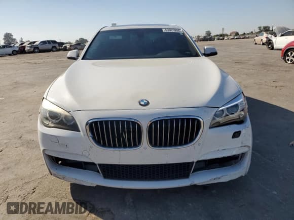 ✅ 2014 BMW 7 Series 740i • VIN: WBAYA6C54ED144402 • Lot: 63025295. Wystawiony na Copart z przebiegiem Nie podano. Bezpłatny archiwum sprzedaży aukcyjnych z USA i szczegółowy raport historii pojazdu na DreamBid. Zdjęcie 5.