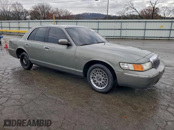 ✅ 1998 Mercury Grand Marquis GS • VIN: 2MEFM74W8WX653299 • Lot: 92753585. Wystawiony na Copart z przebiegiem 129 393 mil. Bezpłatny archiwum sprzedaży aukcyjnych z USA i szczegółowy raport historii pojazdu na DreamBid. Zdjęcie 4.