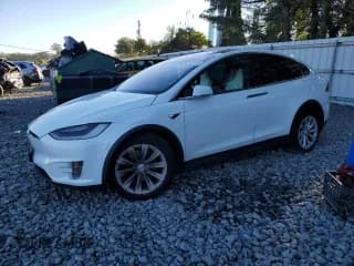✅ 2018 Tesla Model X 75D • VIN: 5YJXCAE2XJF106397 • Лот: 81928705. Опубликован ранее на Copart с пробегом 114 644 миль. Бесплатный доступ к архиву аукционных продаж из США и подробный отчёт об истории автомобиля на DreamBid. Изображение 1.