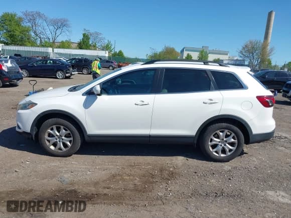 ✅ 2015 Mazda CX-9 Touring • VIN: JM3TB3CV1F0461403 • Lot: 42148325. Listed on IAAI with 143,452 mi. Free auction sales archive from the USA and detailed vehicle history report at DreamBid. Image 14.