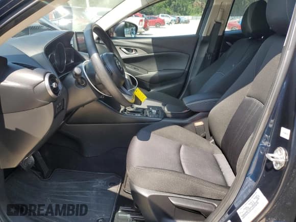 ✅ 2021 Mazda CX-3 Sport • VIN: JM1DKFB78M1516986 • Лот: 70729665. Опубликован ранее на Copart с пробегом 52 603 миль. Бесплатный доступ к архиву аукционных продаж из США и подробный отчёт об истории автомобиля на DreamBid. Изображение 7.