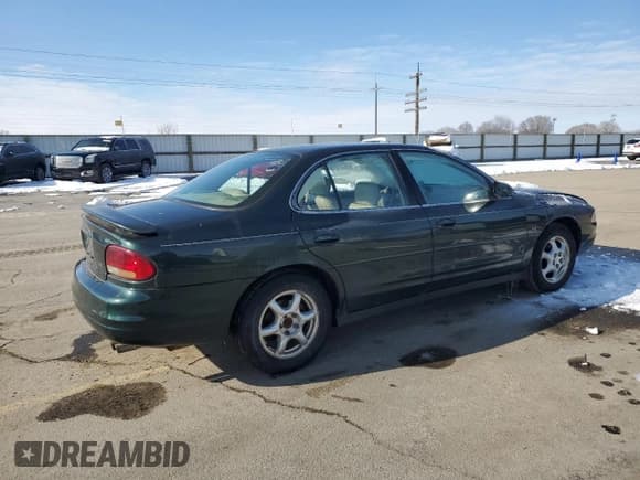 ✅ 1999 Oldsmobile Intrigue GLS • VIN: 1G3WX52H7XF366695 • Лот: 44071415. Опубликован ранее на Copart с пробегом 160 527 миль. Бесплатный доступ к архиву аукционных продаж из США и подробный отчёт об истории автомобиля на DreamBid. Изображение 3.