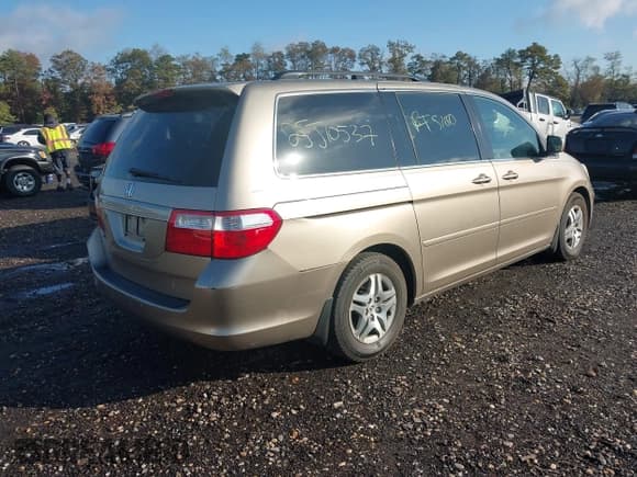 ✅ 2006 Honda Odyssey EX-L • VIN: 5FNRL386X6B409125 • Lot: 43513745. Listed on IAAI with Not provided. Free auction sales archive from the USA and detailed vehicle history report at DreamBid. Image 4.