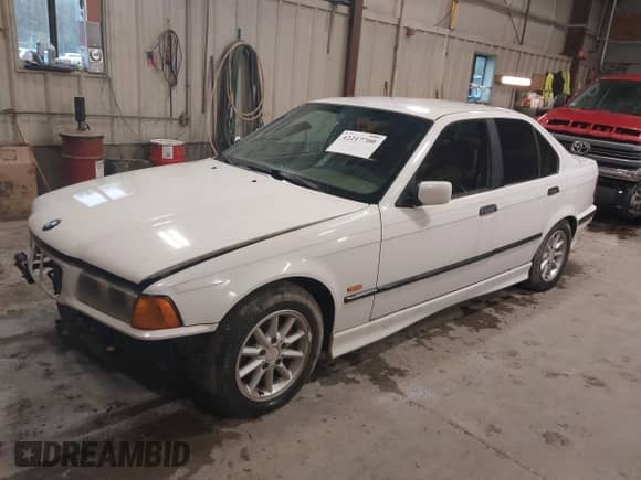 1998 BMW 3 Series 328i with VIN WBACD4323WAV62223, listed as a IAAI auction lot 42217700 with 197,482 mi miles and . Bid and sale history available at DreamBid. Image 2.