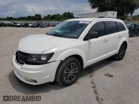 2018 Dodge Journey SE with VIN 3C4PDCAB9JT491354, listed as a Copart auction lot 70309975 with 87,285 mi miles and Salvage title. Bid and sale history available at DreamBid. Image 1.