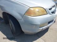 ✅ 2004 Acura MDX • VIN: 2HNYD18234H501799 • Lot: 42980307. Listed on IAAI with 223,899 mi. Free auction sales archive from the USA and detailed vehicle history report at DreamBid. Image 16.