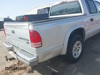 ✅ 2003 Dodge Dakota SLT • VIN: 1D7HL48N83S236590 • Lot: 41796103. Wystawiony na IAAI z przebiegiem 221 667 mil. Bezpłatny archiwum sprzedaży aukcyjnych z USA i szczegółowy raport historii pojazdu na DreamBid. Zdjęcie 6.