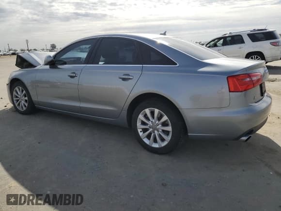 ✅ 2014 Audi A6 Premium • VIN: WAUCFAFC1EN093590 • Lot: 45052735. Listed on Copart with 106,738 mi. Free auction sales archive from the USA and detailed vehicle history report at DreamBid. Image 2.