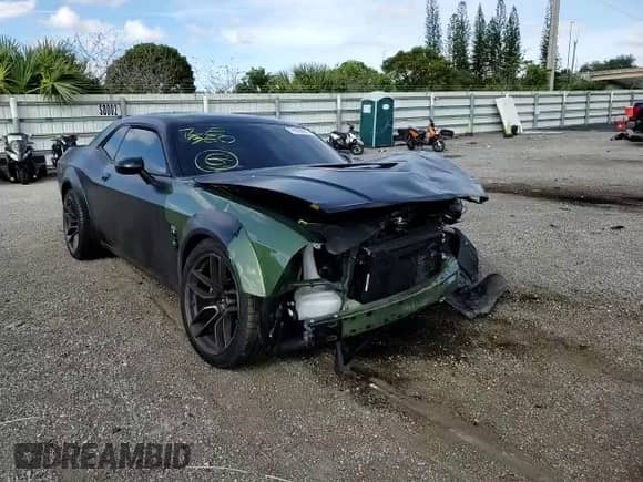 ✅ 2021 Dodge Challenger R/T Scat Pack • VIN: 2C3CDZFJ1MH503175 • Lot: 67695062. Wystawiony na Copart z przebiegiem 16 749 mil mil. Skorzystaj z bezpłatnego archiwum sprzedaży aukcyjnych z USA i zobacz szczegółowy raport historii pojazdu na DreamBid. Zdjęcie 11.