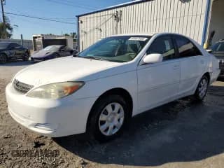 ✅ 2002 Toyota Camry XLE • VIN: 4T1BE32K52U115114 • Lot: 92667695. Listed on Copart with 161,368 mi. Free auction sales archive from the USA and detailed vehicle history report at DreamBid. Image 1.