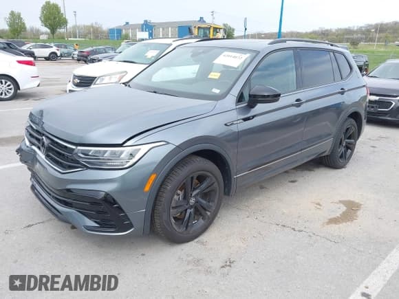 ✅ 2023 Volkswagen Tiguan SE R-Line Black • VIN: 3VVCB7AX5PM039767 • Lot: 42014072. Wystawiony na IAAI z przebiegiem 18 424 mil. Bezpłatny archiwum sprzedaży aukcyjnych z USA i szczegółowy raport historii pojazdu na DreamBid. Zdjęcie 2.