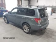 ✅ 2012 Subaru Forester X Touring • VIN: JF2SHAHC1CH406270 • Lot: 42166953. Listed on IAAI with 144,843 mi. Free auction sales archive from the USA and detailed vehicle history report at DreamBid. Image 3.