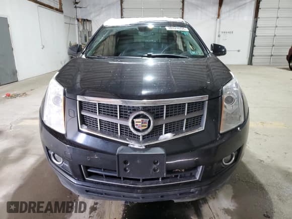 ✅ 2012 Cadillac SRX Premium Collection • VIN: 3GYFNFE31CS653641 • Lot: 38424094. Wystawiony na Copart z przebiegiem 100 677 mil. Bezpłatny archiwum sprzedaży aukcyjnych z USA i szczegółowy raport historii pojazdu na DreamBid. Zdjęcie 5.