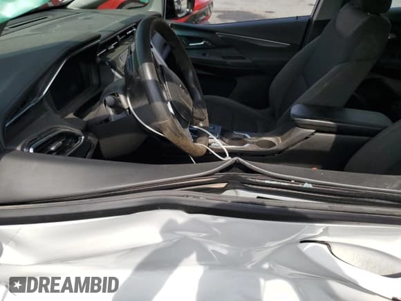 ✅ 2023 Chevrolet Bolt EV 1LT • VIN: 1G1FW6S08P4107284 • Lot: 82063735. Listed on Copart with 45,141 mi. Free auction sales archive from the USA and detailed vehicle history report at DreamBid. Image 7.