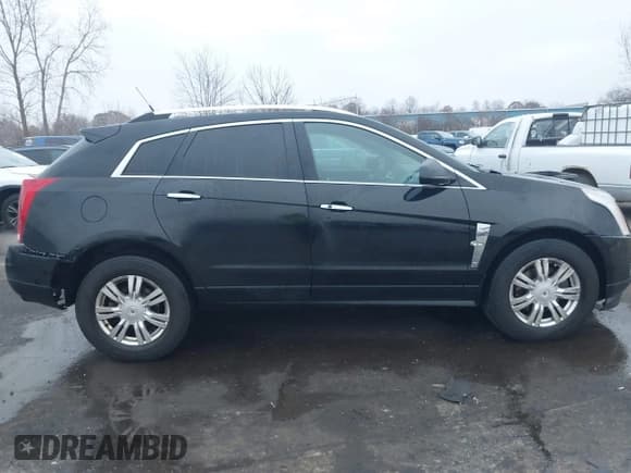 ✅ 2011 Cadillac SRX Luxury Collection • VIN: 3GYFNAEY6BS662090 • Lot: 43755141. Wystawiony na IAAI z przebiegiem 170 687 mil. Bezpłatny archiwum sprzedaży aukcyjnych z USA i szczegółowy raport historii pojazdu na DreamBid. Zdjęcie 13.