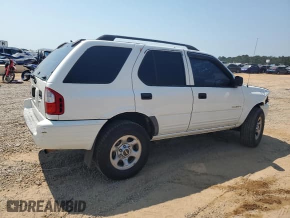 ✅ 2003 Isuzu Rodeo • VIN: 4S2CK58W134304842 • Lot: 80434175. Listed on Copart with 317,255 mi. Free auction sales archive from the USA and detailed vehicle history report at DreamBid. Image 3.