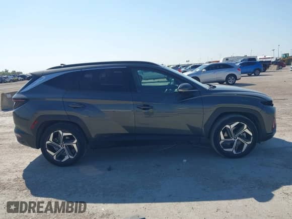 2022 Hyundai Tucson Limited z VIN KM8JE3AE7NU066266, wystawiony jako IAAI lot #43173555 z przebiegiem 76 428 mil mil oraz . Historia ofert i sprzedaży dostępna na DreamBid. Obrazek 13.